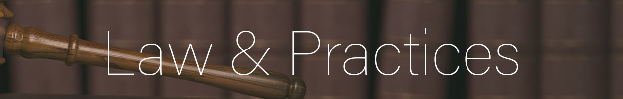 Gavel on the background of vintage lawyer books. Concept of law